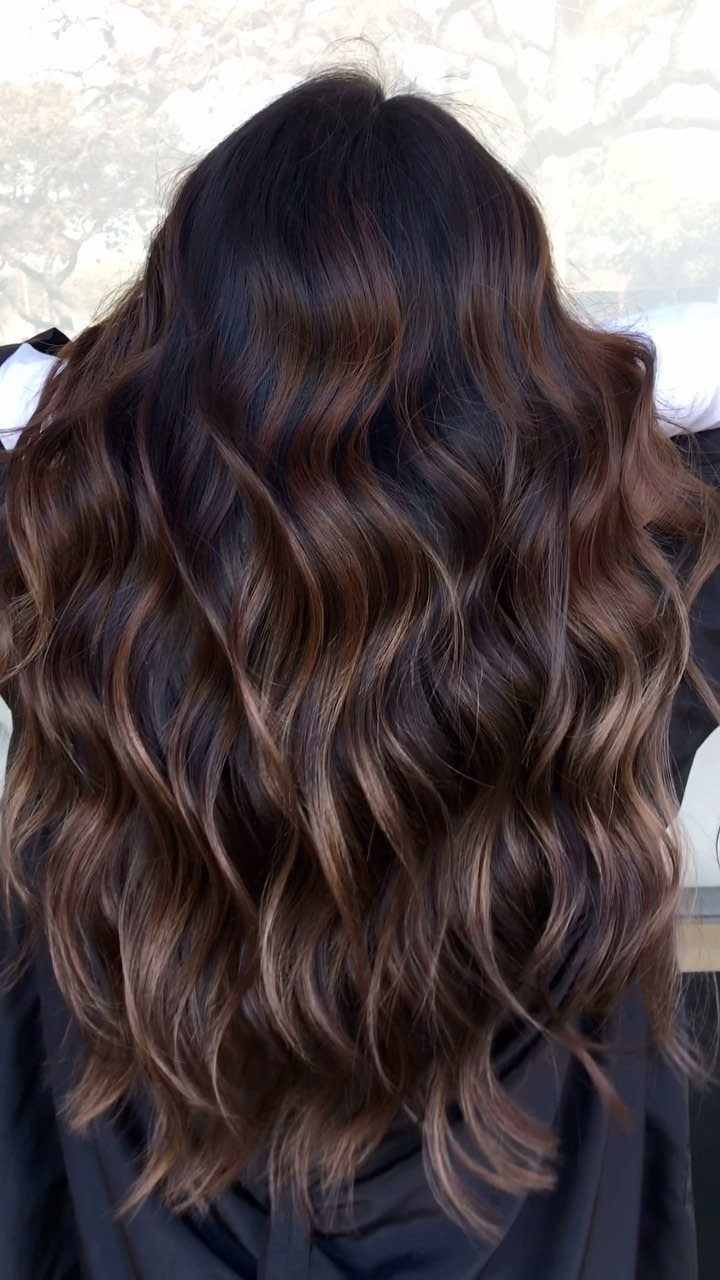 Long wavy dark chocolate hair with dimensional balayage highlights
